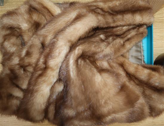 A mink stole, size 10-12